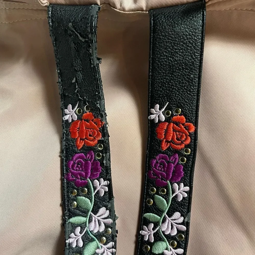 Steve Madden Nylon blush pink backpack with black embroidery back straps.